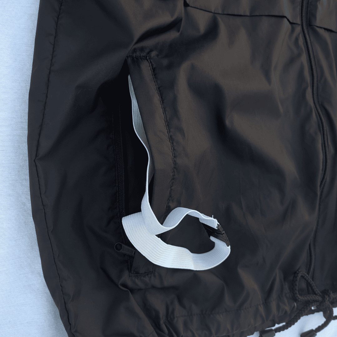 Bolsillo cremallera cortavientos running negro hombre